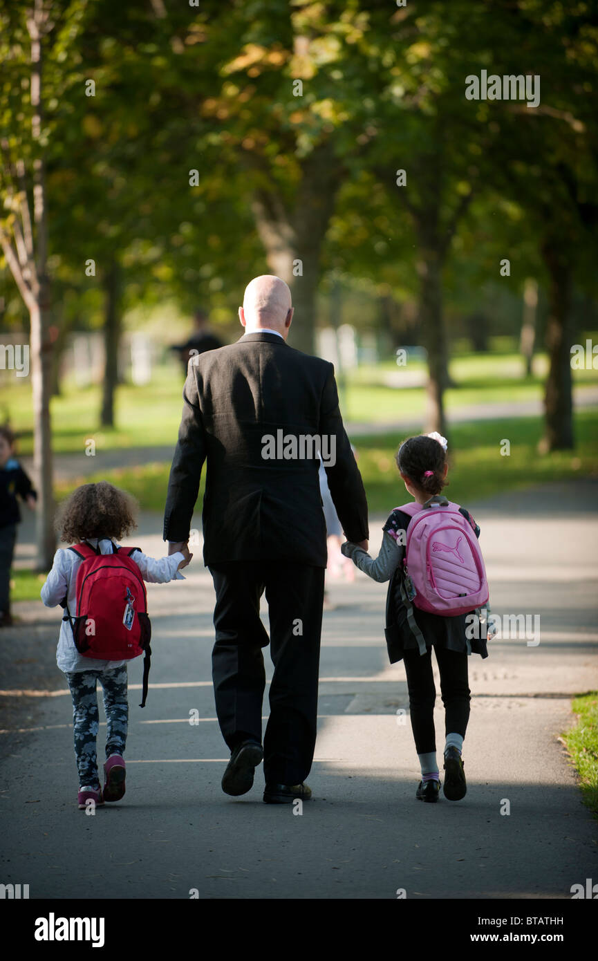 School children walking home hi-res stock photography and images - Alamy