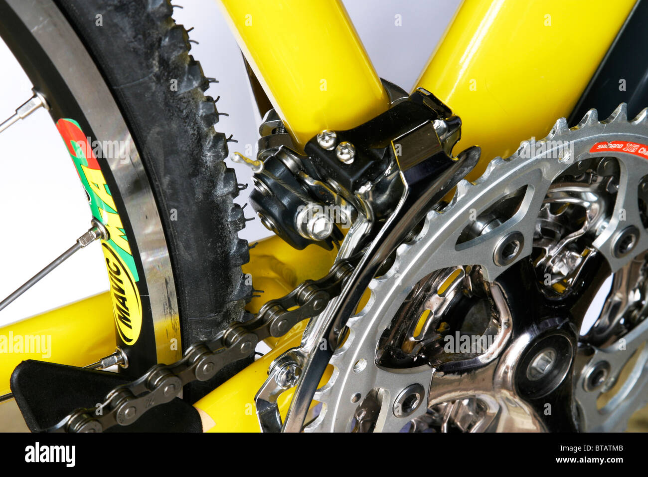 cutout closeup of alloy framed yellow hybrid roadster trekking fitness