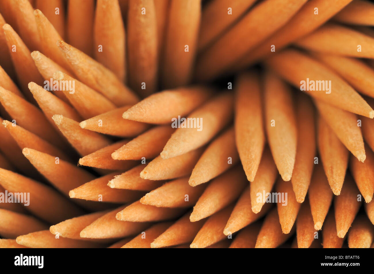 Closeup image of round toothpicks in a swirl pattern Stock Photo - Alamy