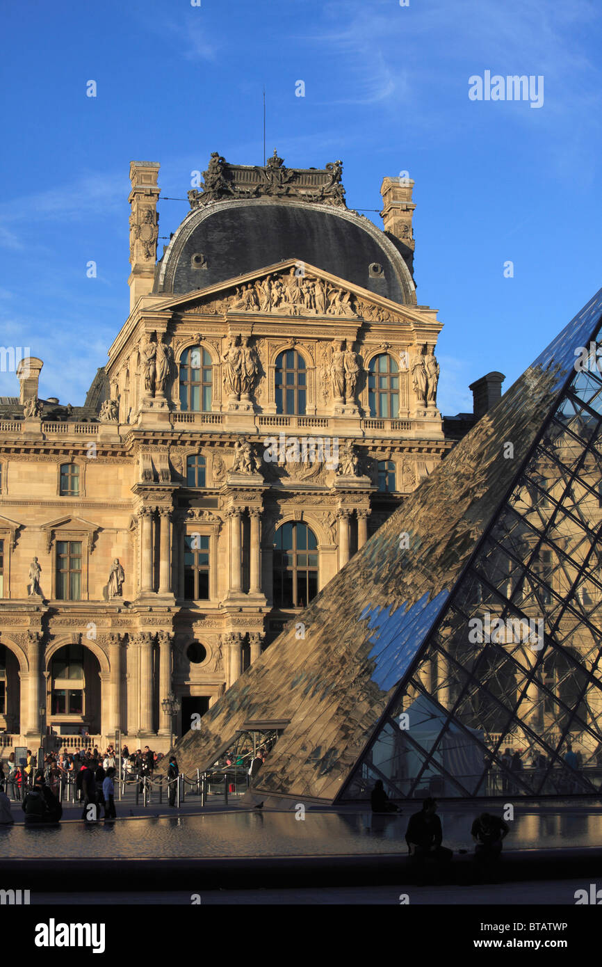 France, Paris, Louvre palace, museum, Cour Napoléon, Pyramide, Stock Photo
