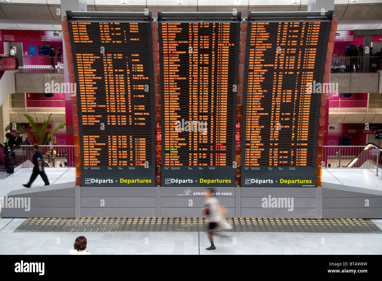 Departure board located in the Paris-Charles de Gaulle Airport, Paris, France. Stock Photo
