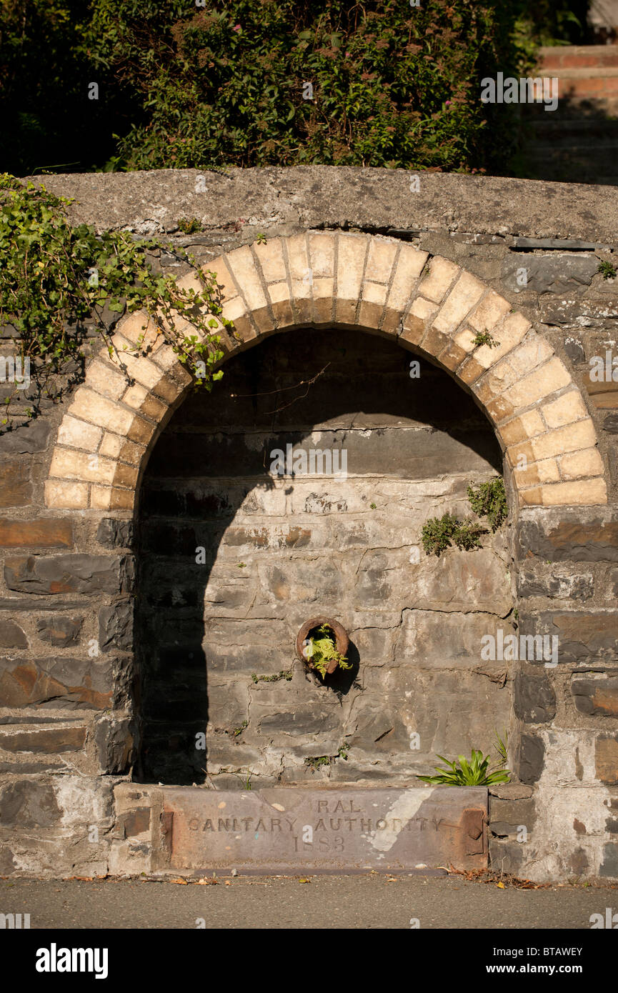 An old dried up municipal water fountain "rural sanitary authority 1883" Aberystwyth Wales UK