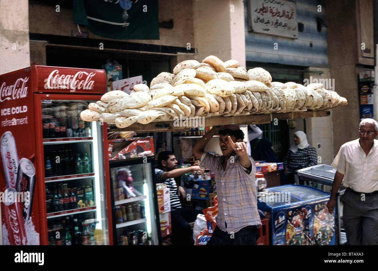 No photo! Bread runner on his way to a customer in Fatimid Cairo. Stock Photo