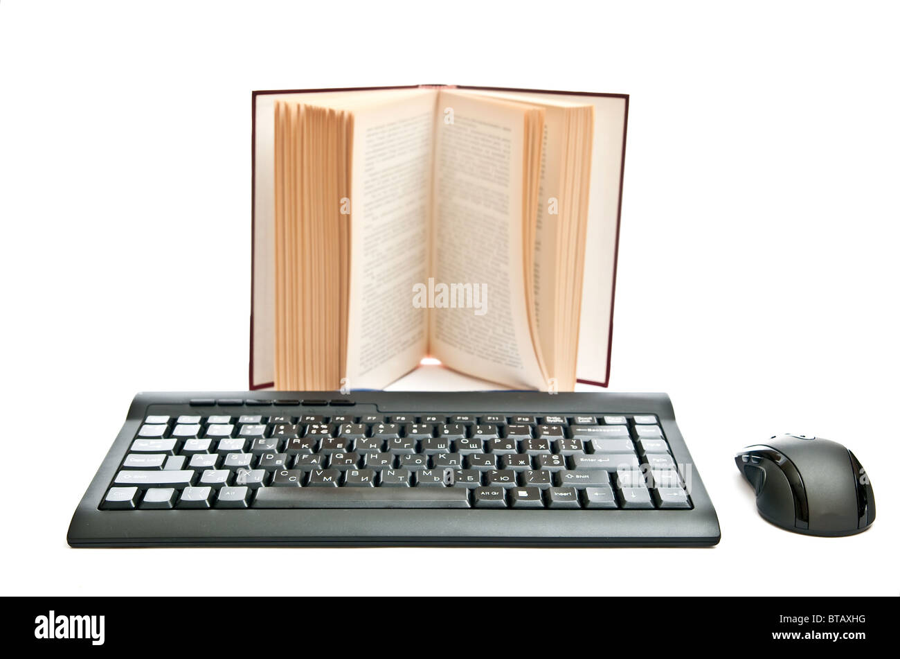 Keyboard and book Stock Photo Alamy