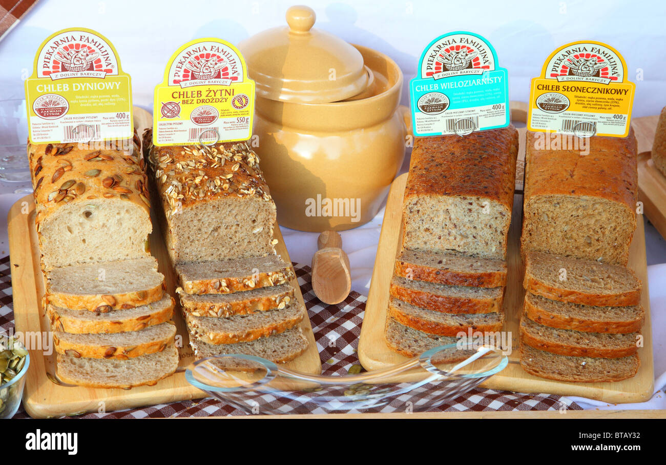 Loafs of organic bread partially sliced Stock Photo
