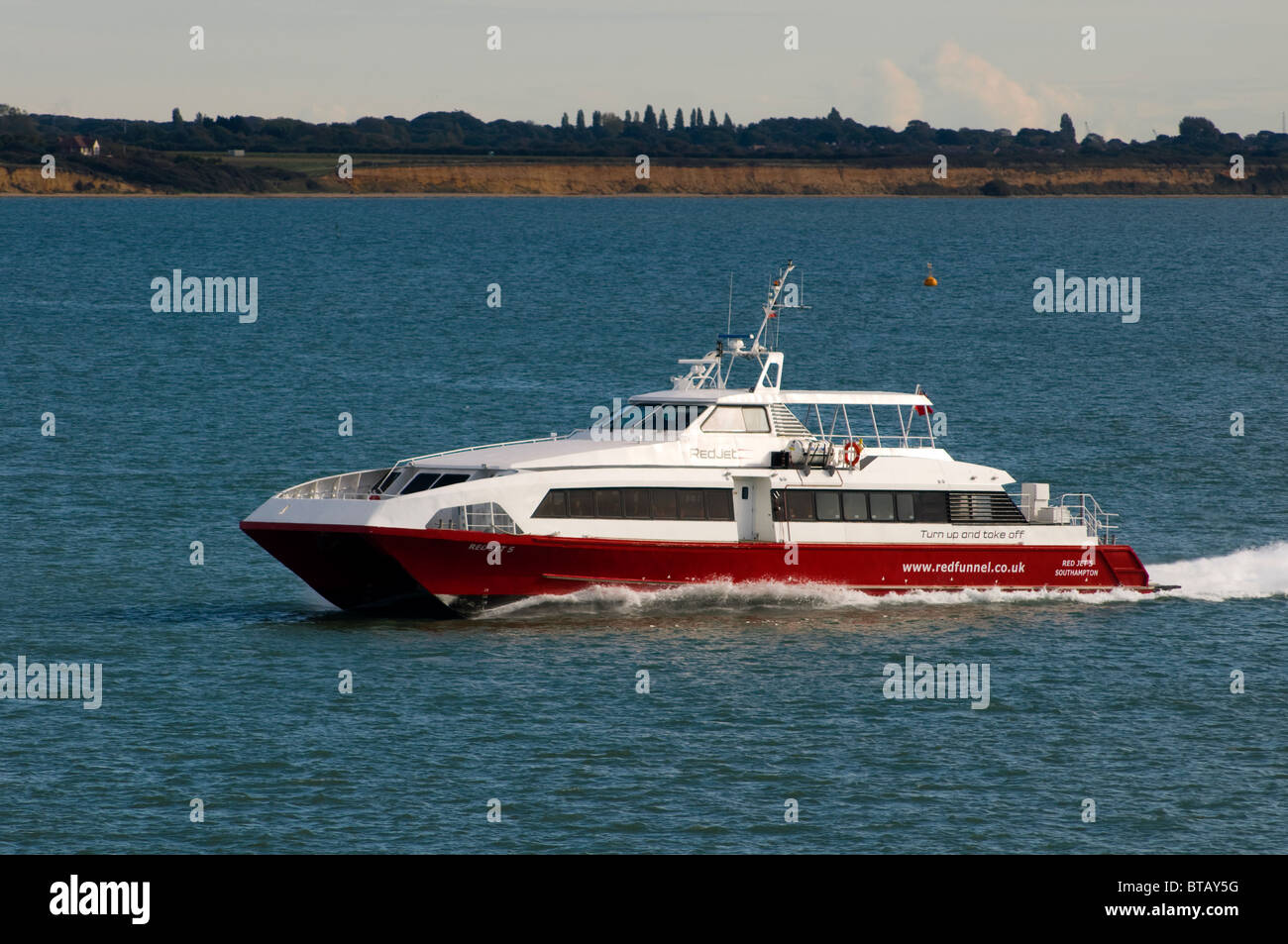 Red Jet 5, one of the fast Red Funnel hydrofoil ferries on Southampton water taking passengers to the Isle of Wight Stock Photo