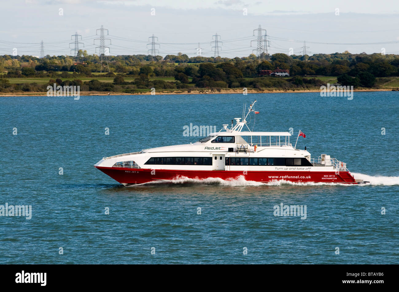 Red Jet 5, one of the fast Red Funnel hydrofoil ferries on Southampton water taking passengers to the Isle of Wight Stock Photo