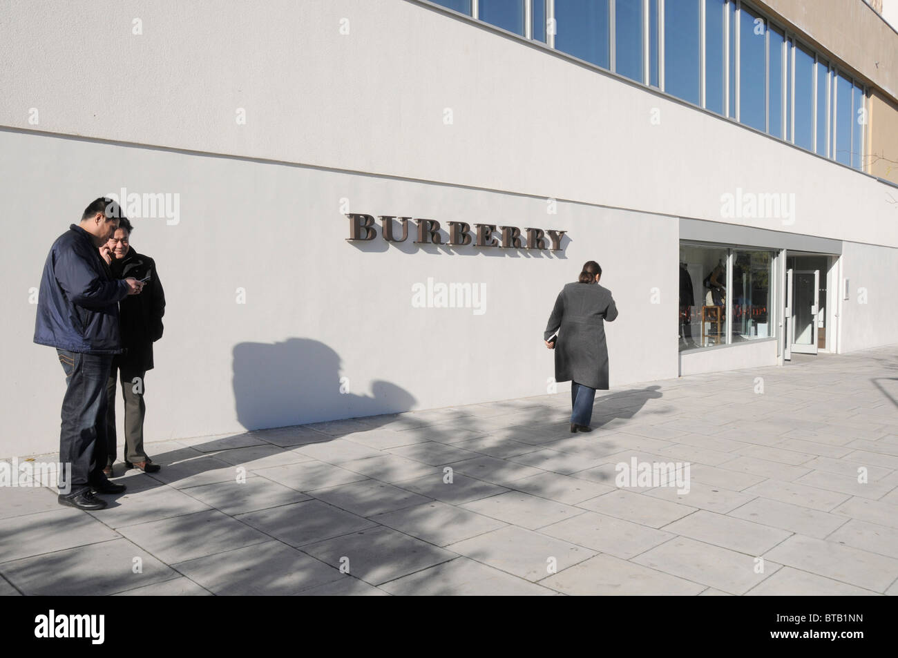 Shoppers at the Burberry outlet store in Hackney, London, UK Stock - Alamy