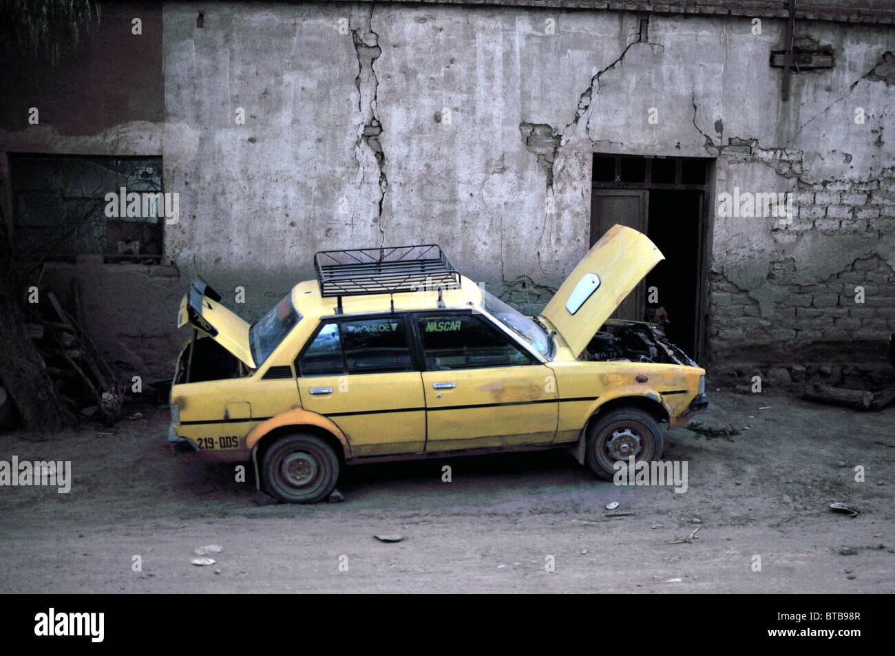 Broken down car, Bolivia. Stock Photo