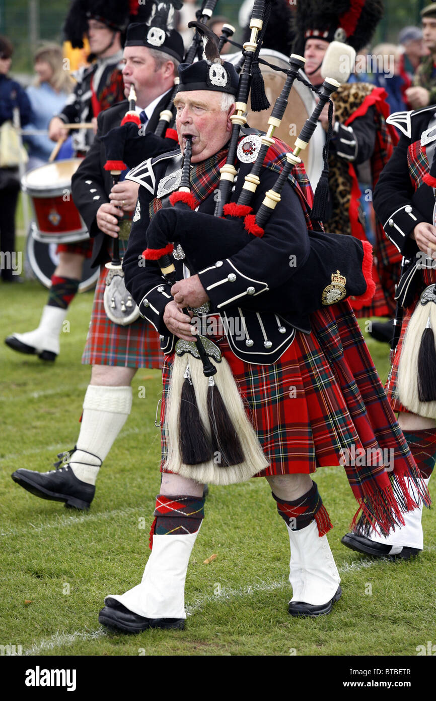 Scottish Highland Marching Band, Glenurquhart Highland Gathering and Games, Blairbeg Park, Drumnadrochit, Scotland Stock Photo