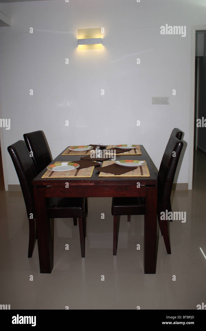 A dining table arranged for a family Stock Photo Alamy