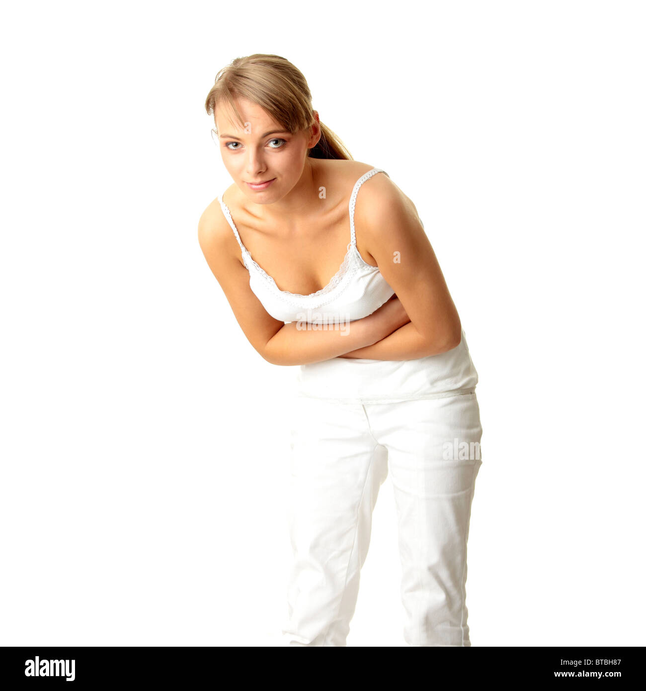 Woman with stomach issues isolated on white background Stock Photo