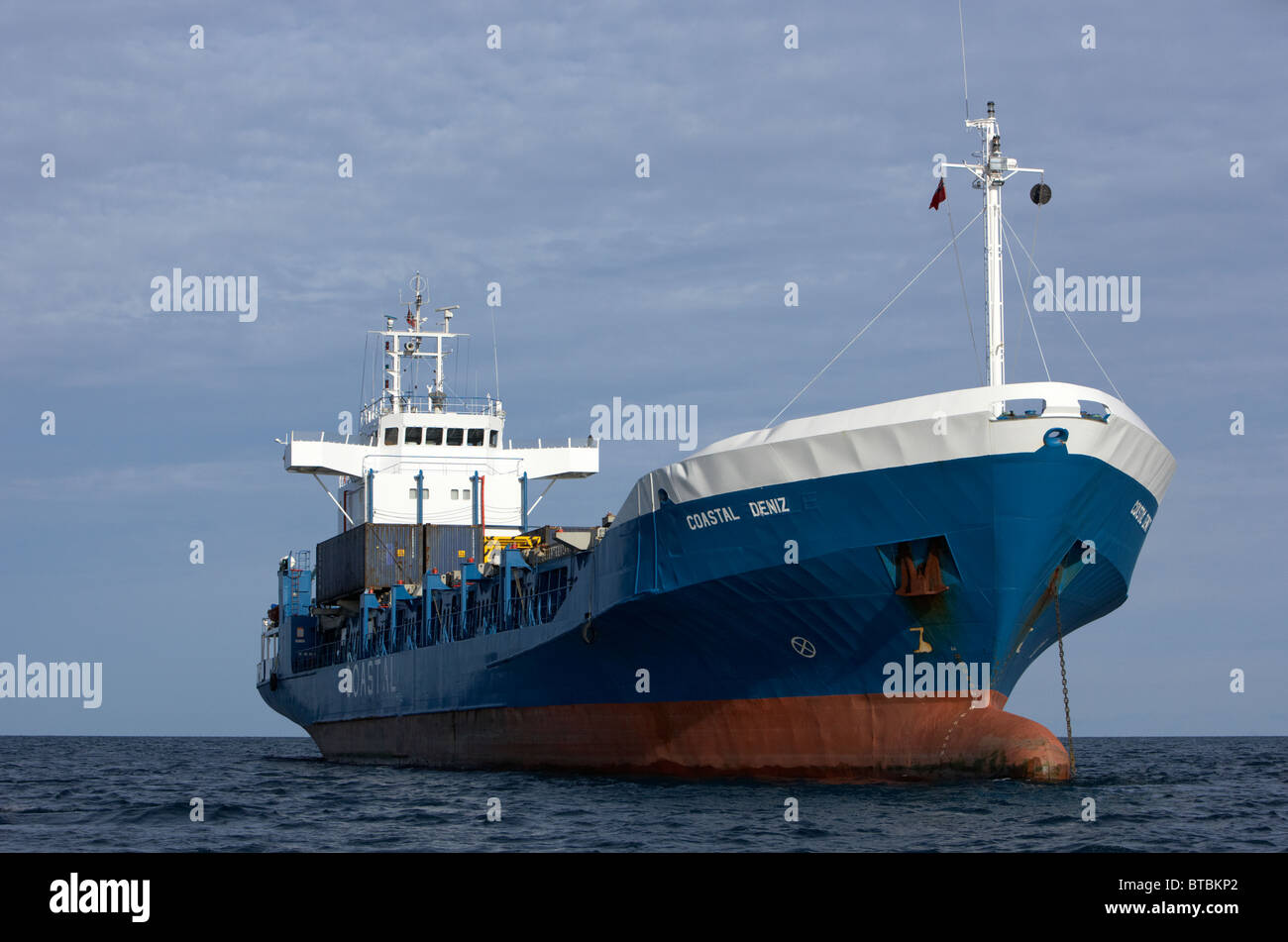 coastal deniz dry cargo hazard a major ship at anchor in coastal waters of the uk Stock Photo