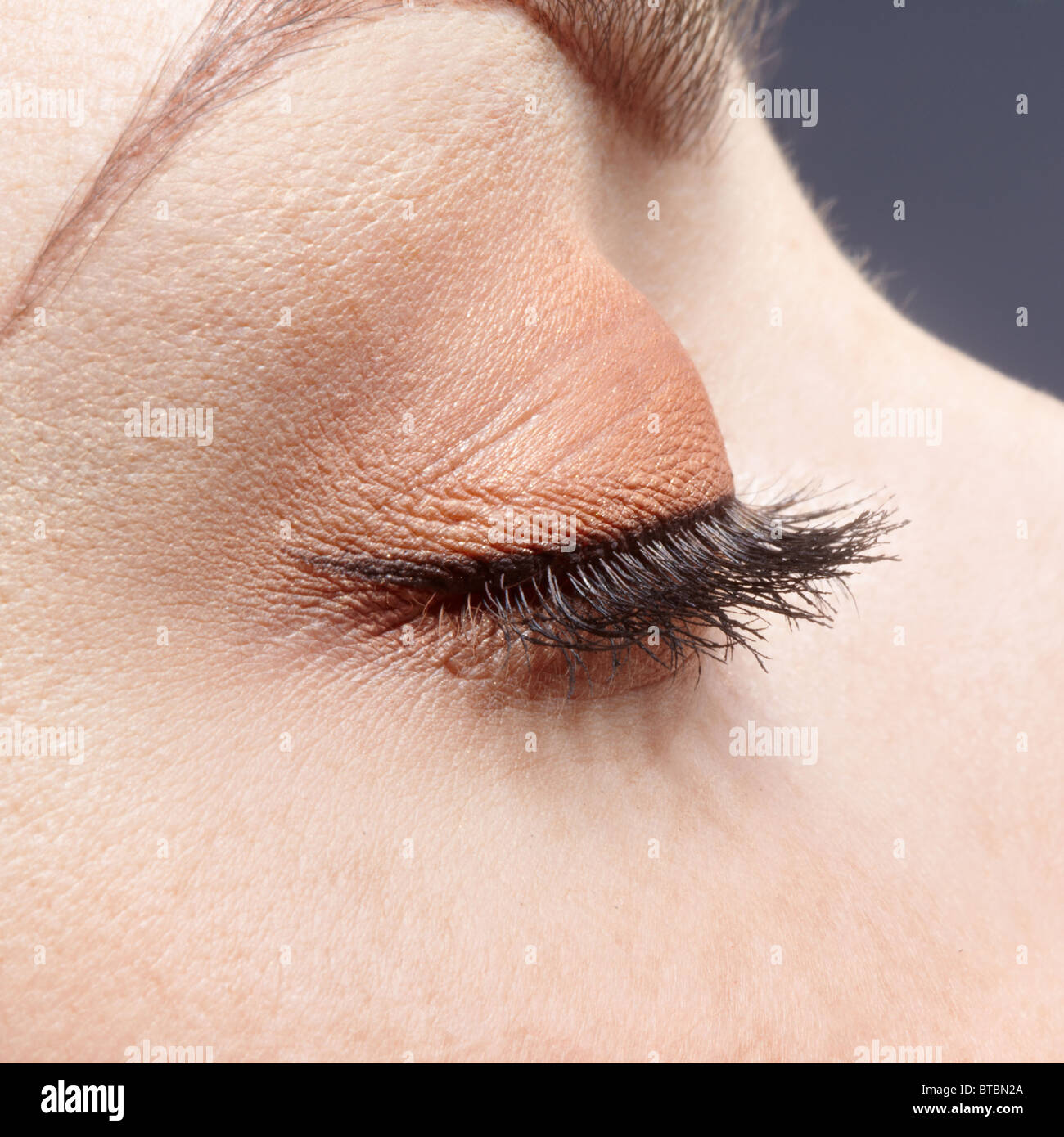 close-up portrait of freckled girl's eye zone Stock Photo