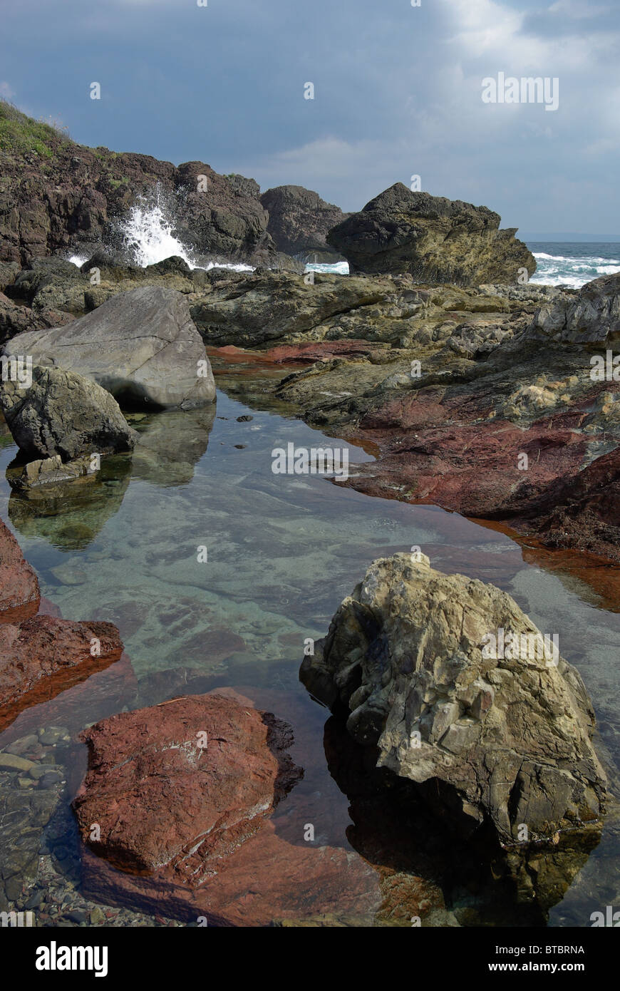 Tide Pool Between Pillow Shaped Lava Rocks On The East Of