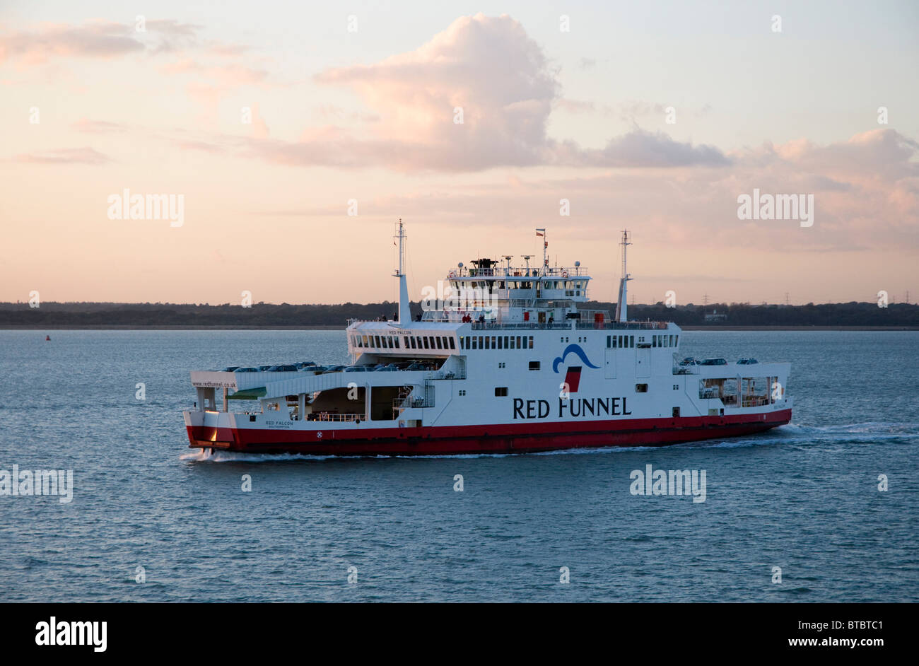 The Red Falcon, one of the ferries operated by Red Funnel, taking passengers and cars to the Isle of Wight, Evening light. Stock Photo