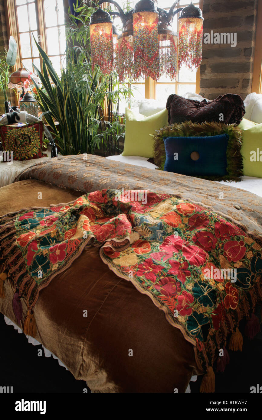 Colorful bed runner and throw pillows on bed Stock Photo Alamy