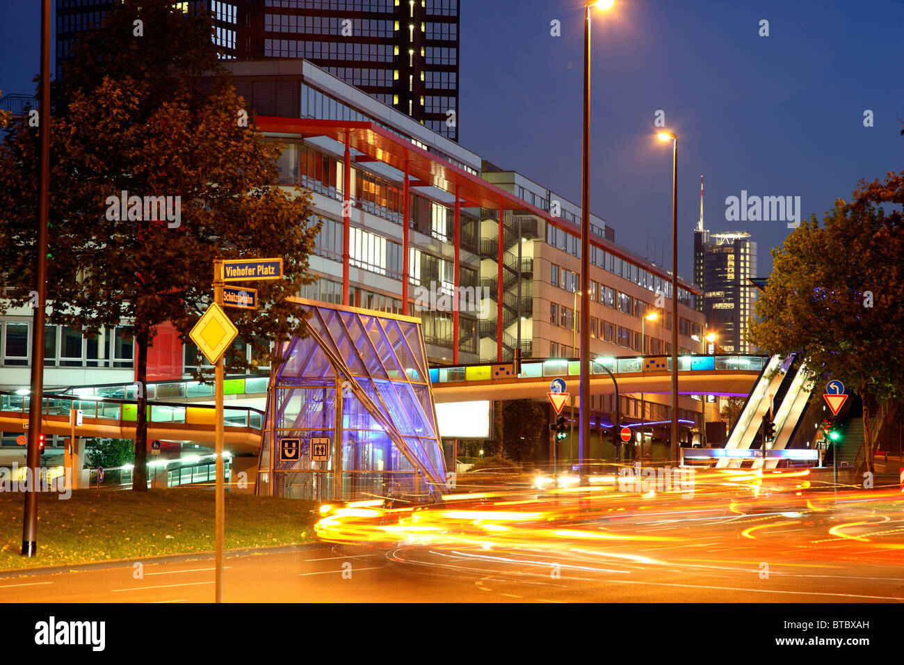 City center of Essen, Germany. Viehofer Platz, square at dusk, town hall, city traffic. Stock Photo