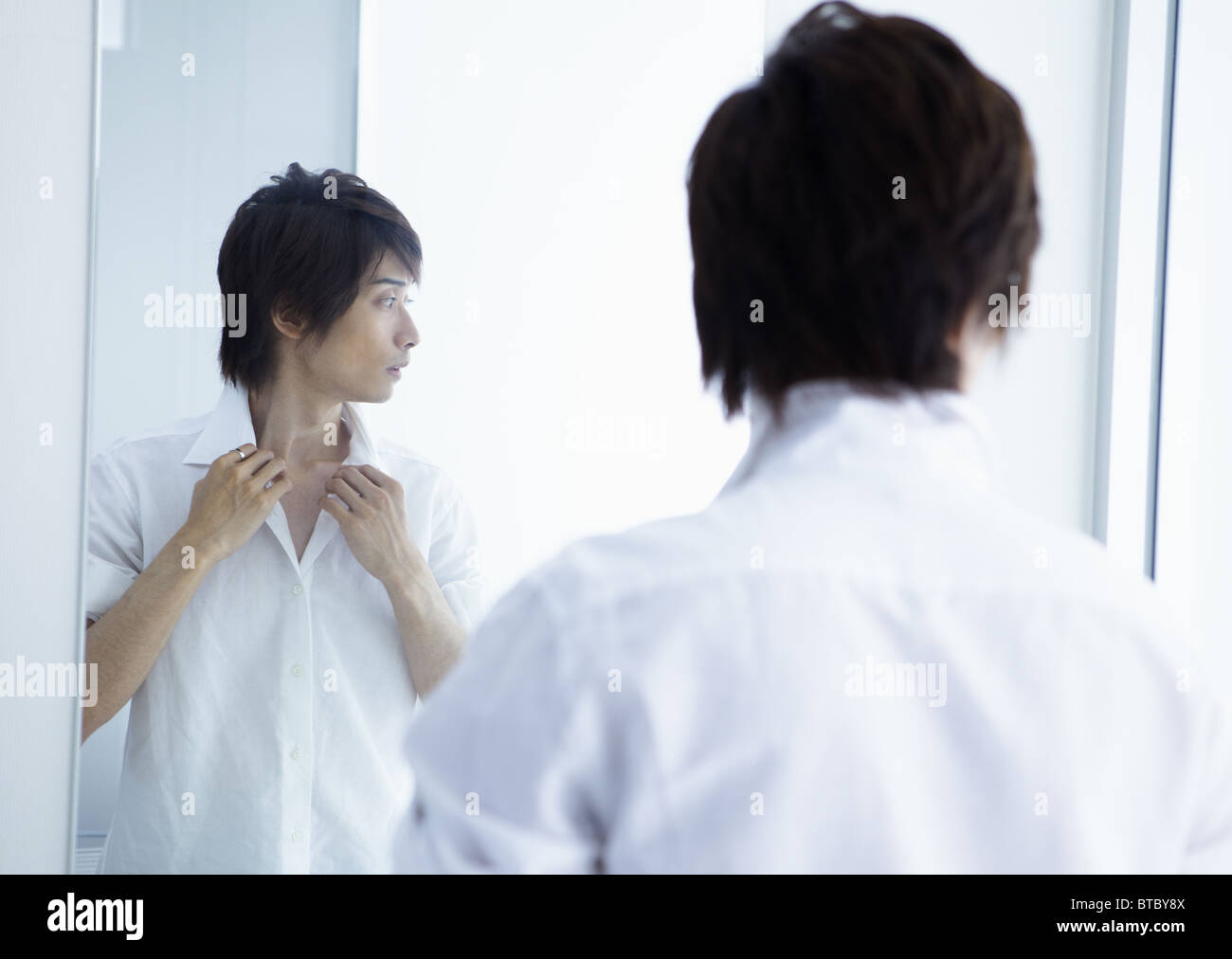 Young man getting ready Stock Photo - Alamy