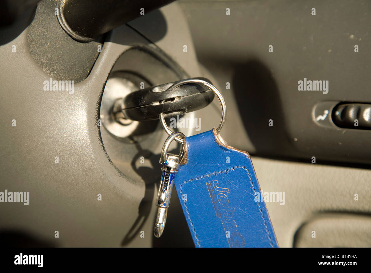 Car key in ignition lock Stock Photo Alamy