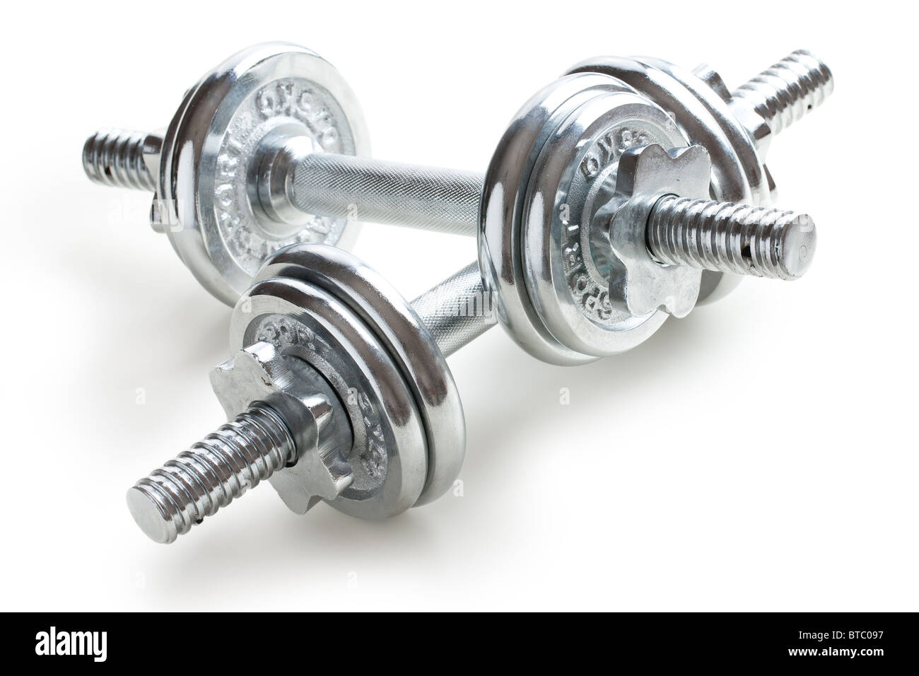 chrome dumbells on white background Stock Photo