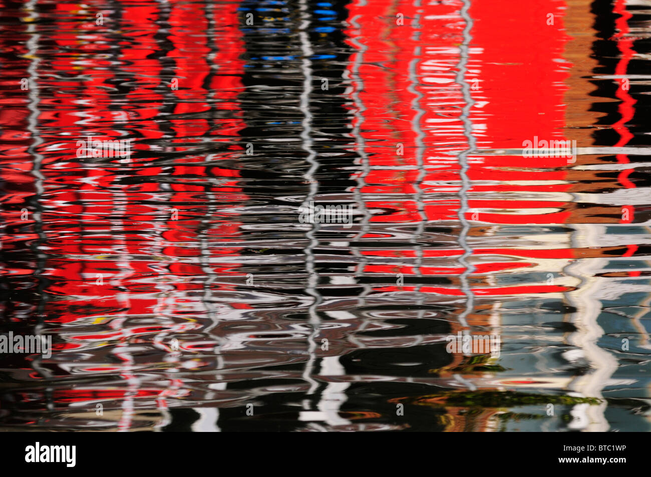 Abstract Reflection of Buildings in the River Cam, Cambridge, England, UK Stock Photo