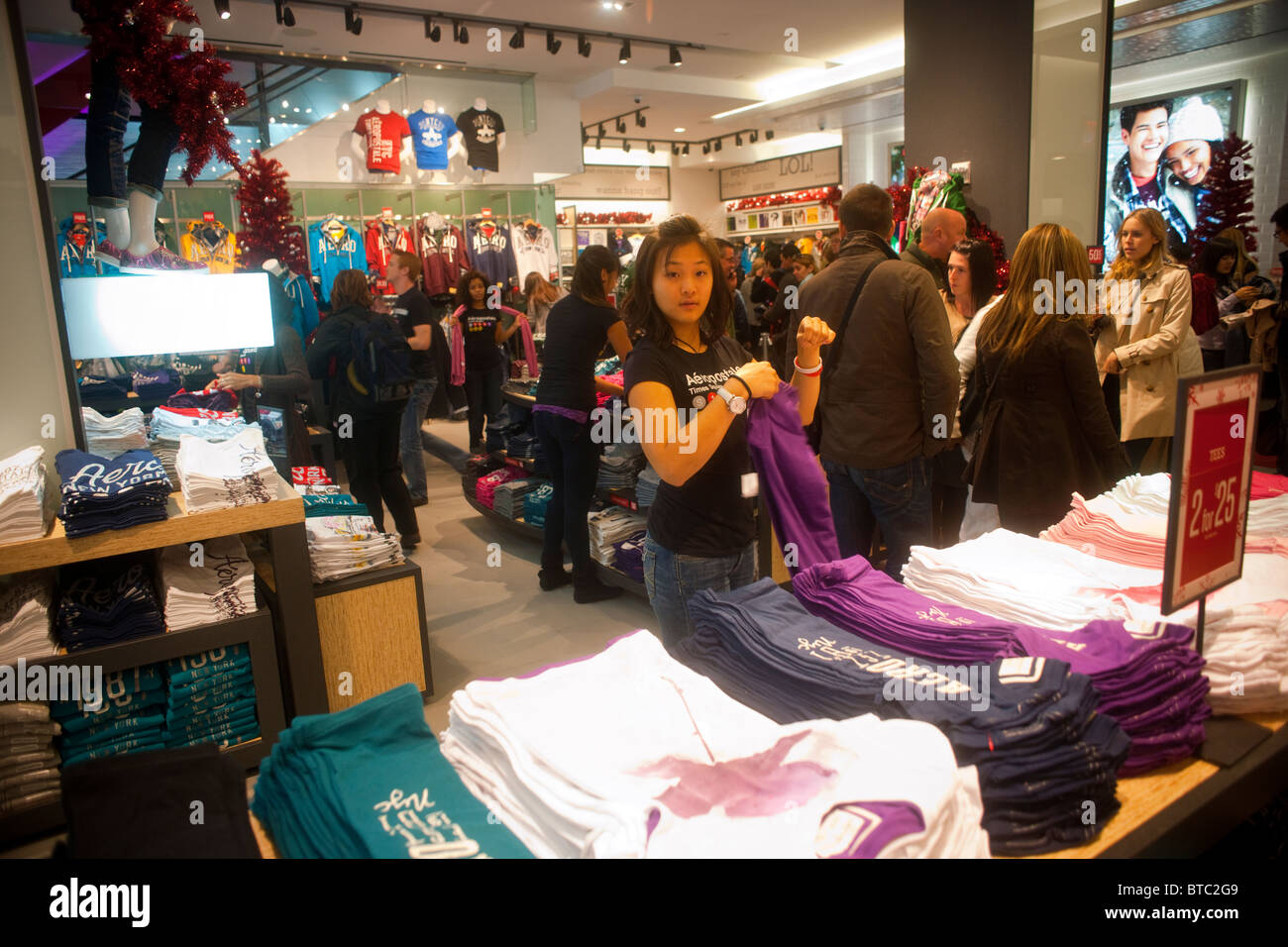 Shoppers and workers in the new Aeropostale clothing store in Times Square  in New York on opening day Stock Photo - Alamy