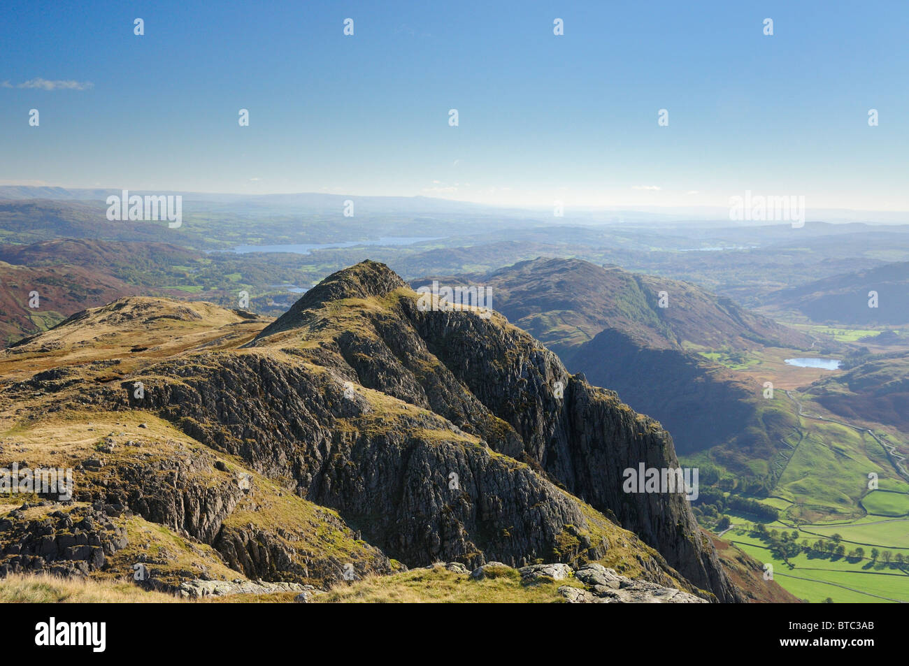 View from Pike of Stickle towards Loft Crag with Windermere in the background. English Lake District Stock Photo