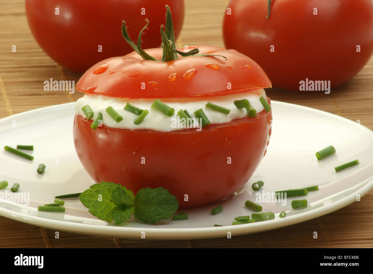 Organic Tomato With Low Fat Cottage Cheese And Dill Stock Photo