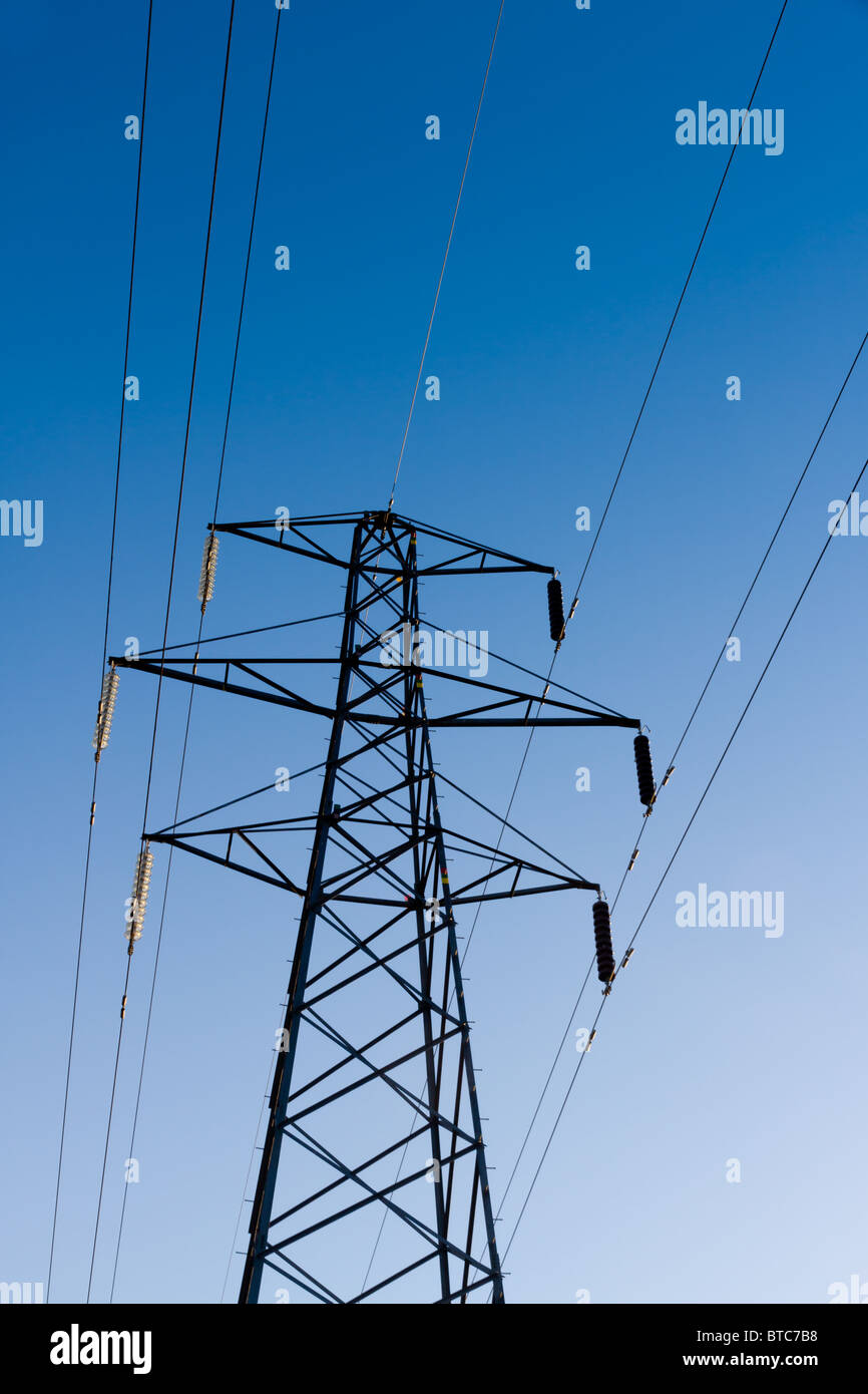 Electricity Pylon and Power Lines on Blue Sky Background Stock Photo ...