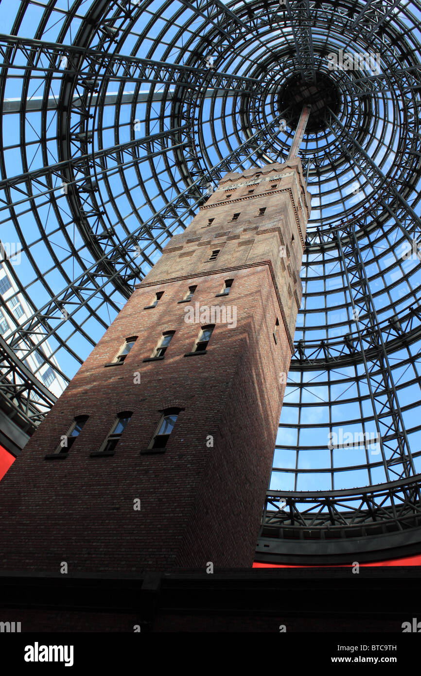 Walter Coop’s Shot Tower and Factory, now enclosed in a glass pyramidal cone in Melbourne Central Station Shopping Centre Stock Photo