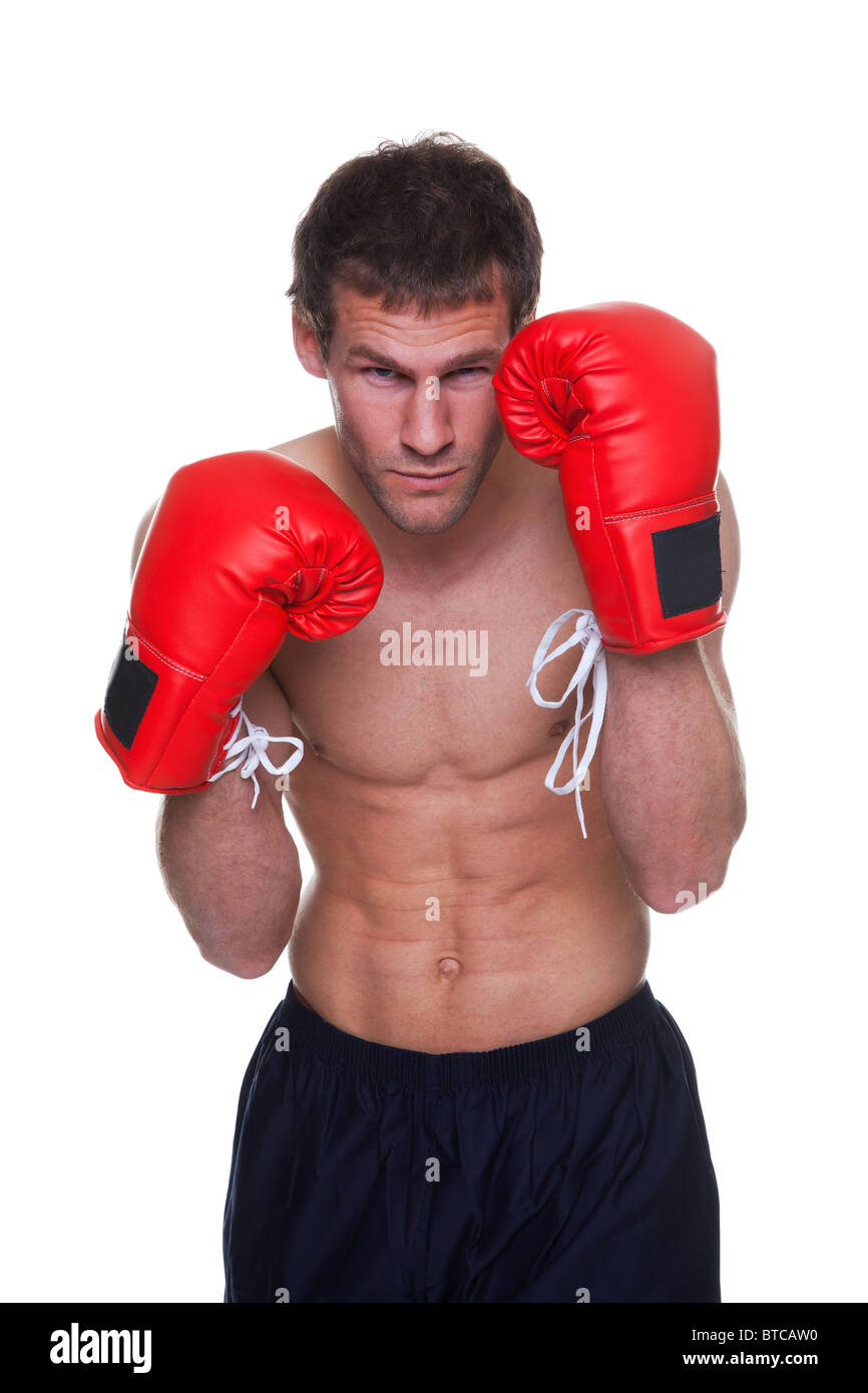 Male boxer in a defensive stance isolated on white background Stock