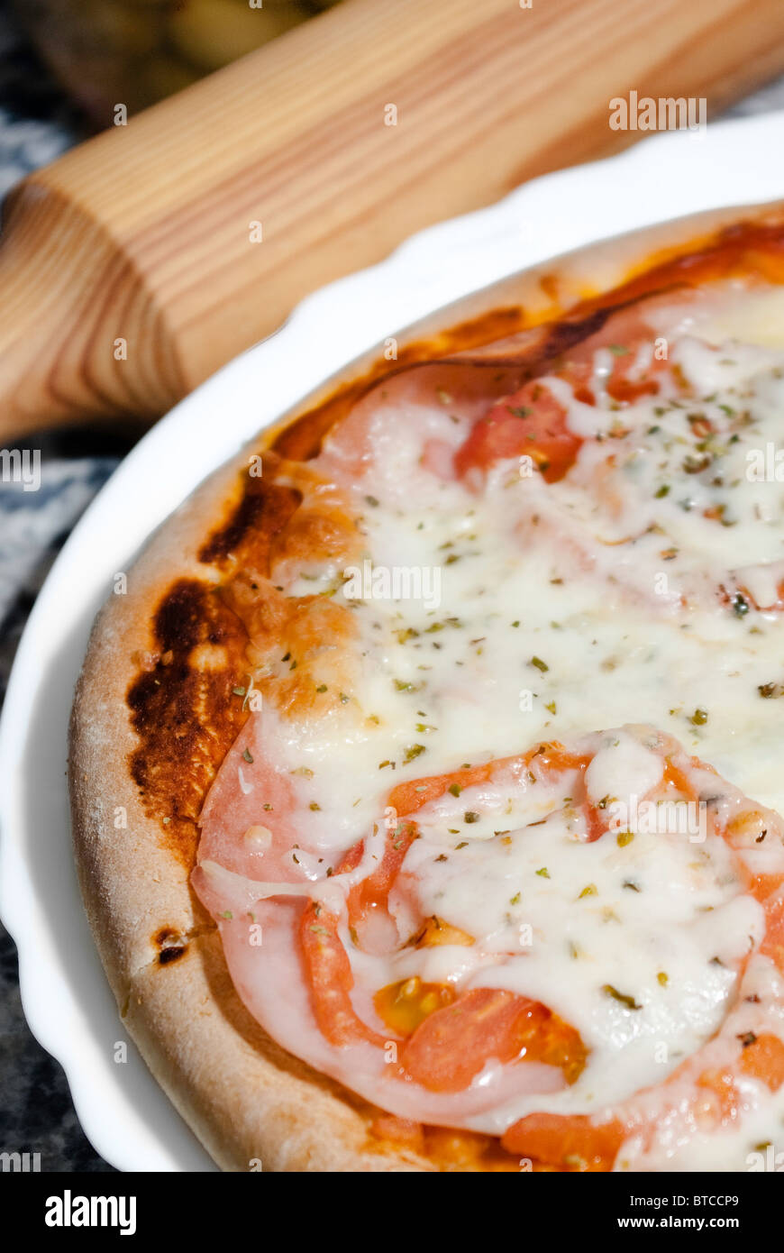 Ham Pizza with mozzarella Stock Photo Alamy