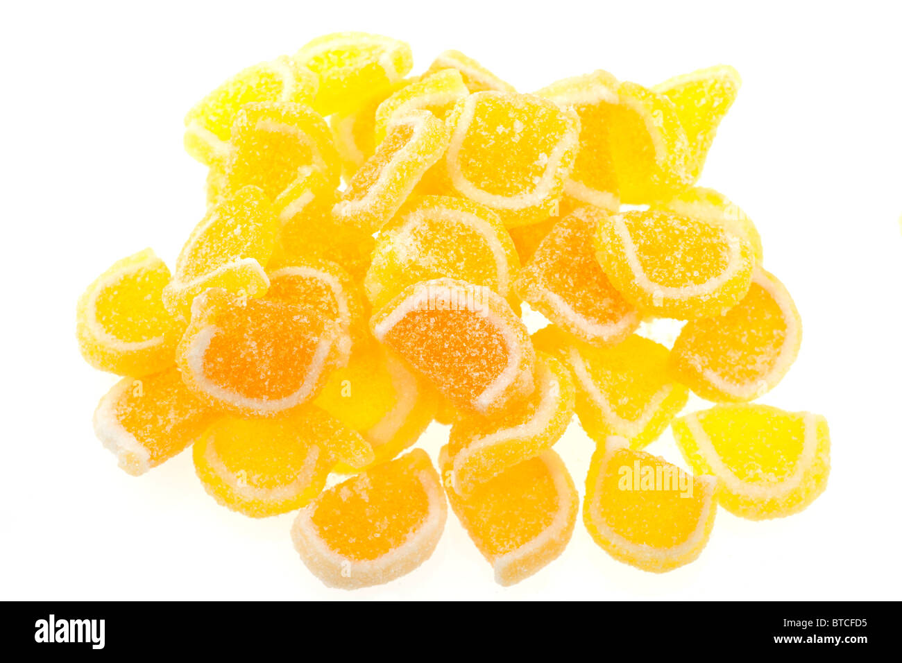 orange-and-lemon-slices-covered-in-sugar-cake-decoration-stock-photo