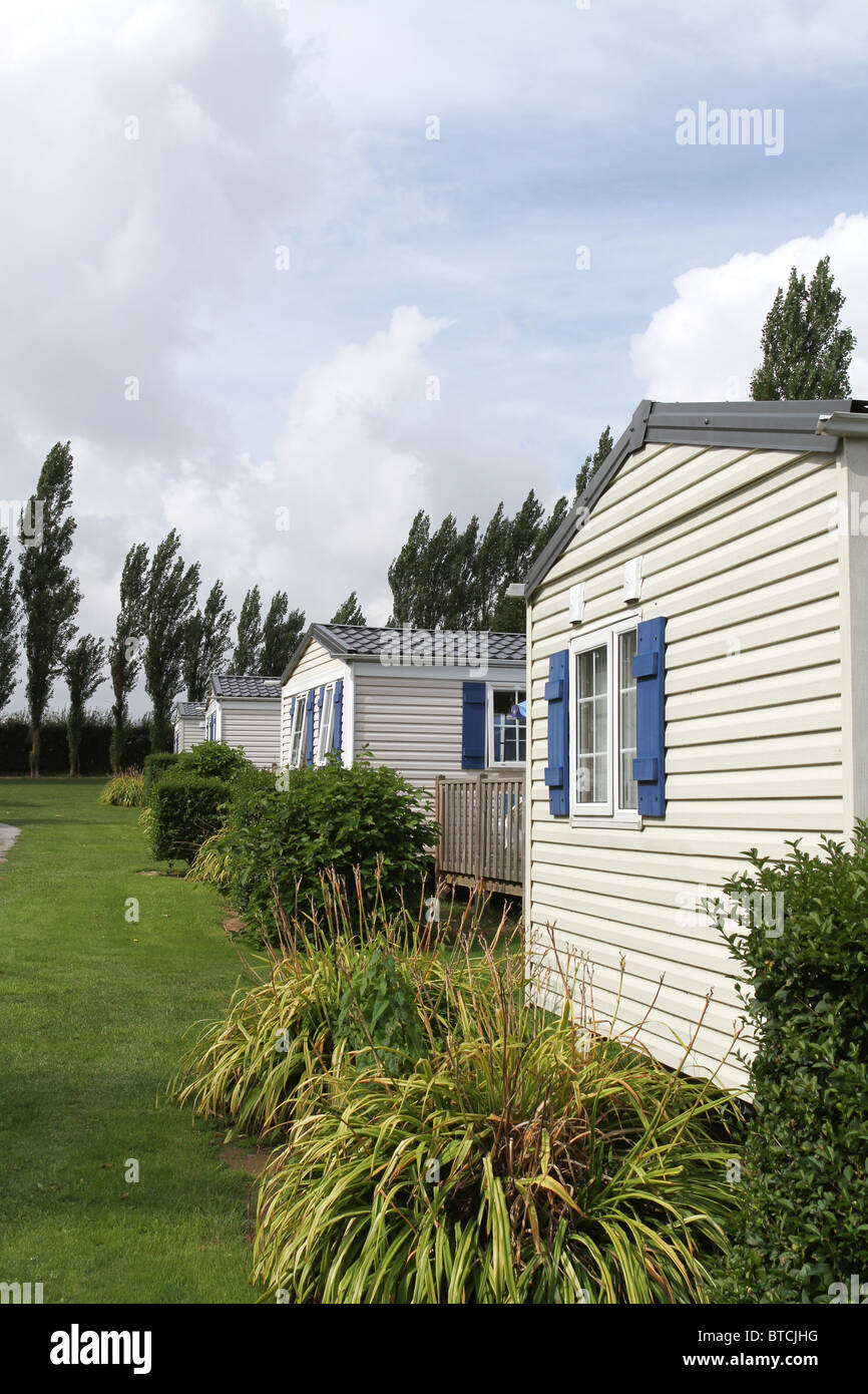 Vacation holiday homes in a row on a caravan park Stock Photo Alamy