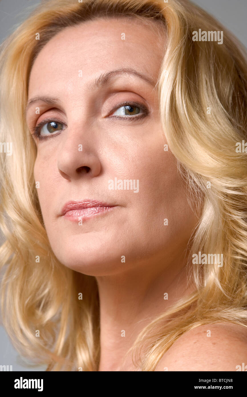 Headshot of mature blond woman Stock Photo