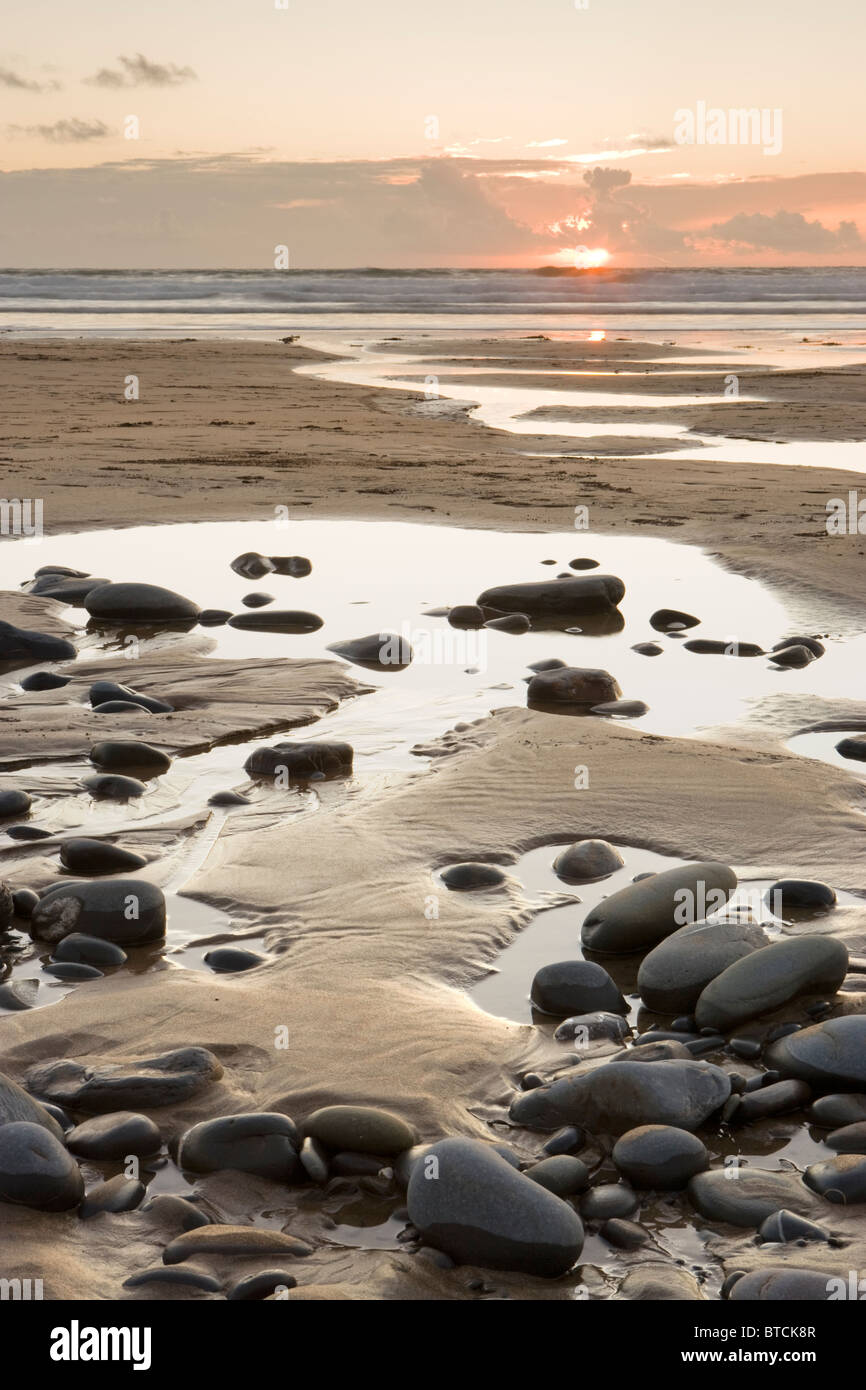 Sunset at Sandy Mouth beach near Bude, Cornwall, UK Stock Photo