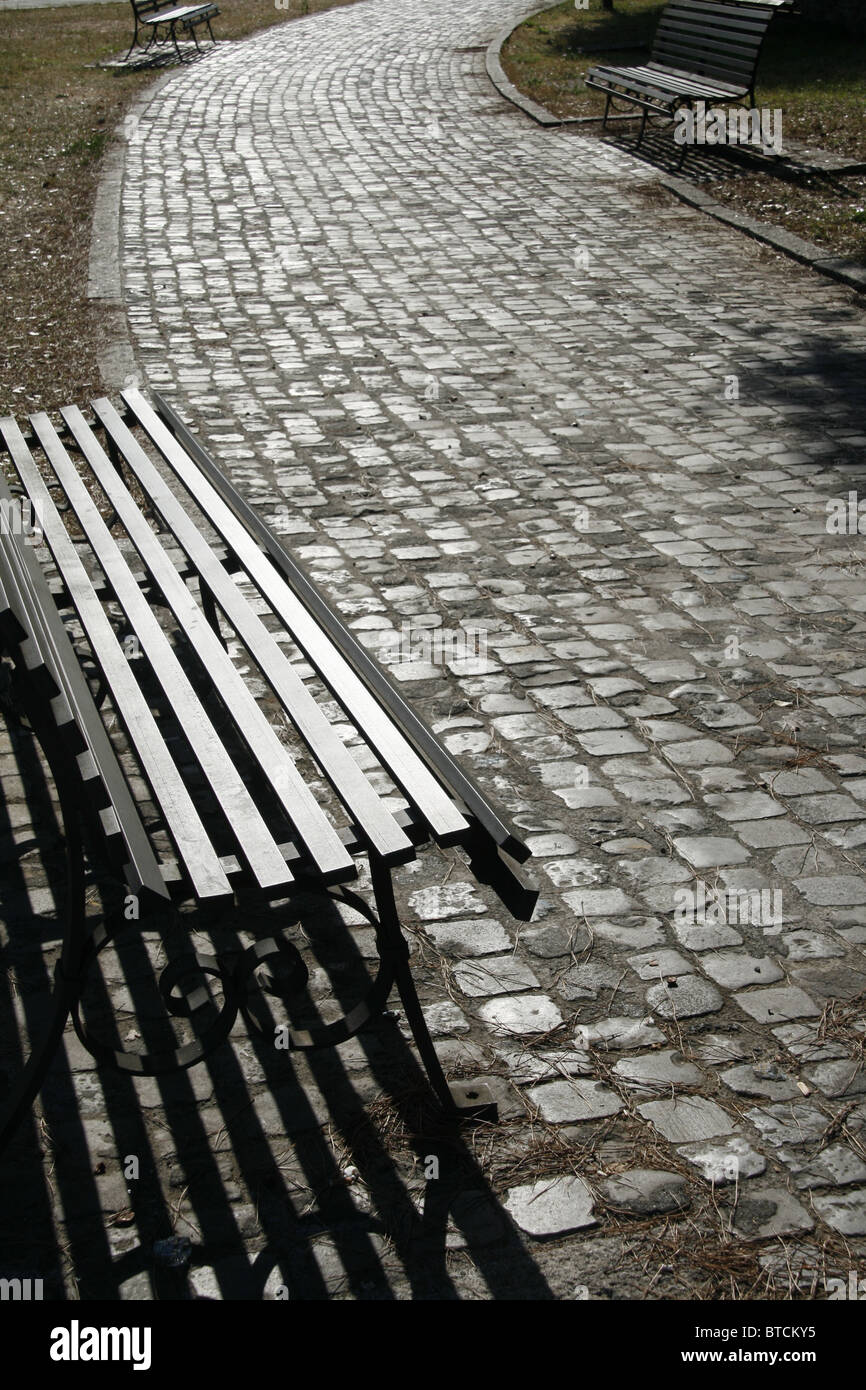 three empty benches in park Stock Photo - Alamy