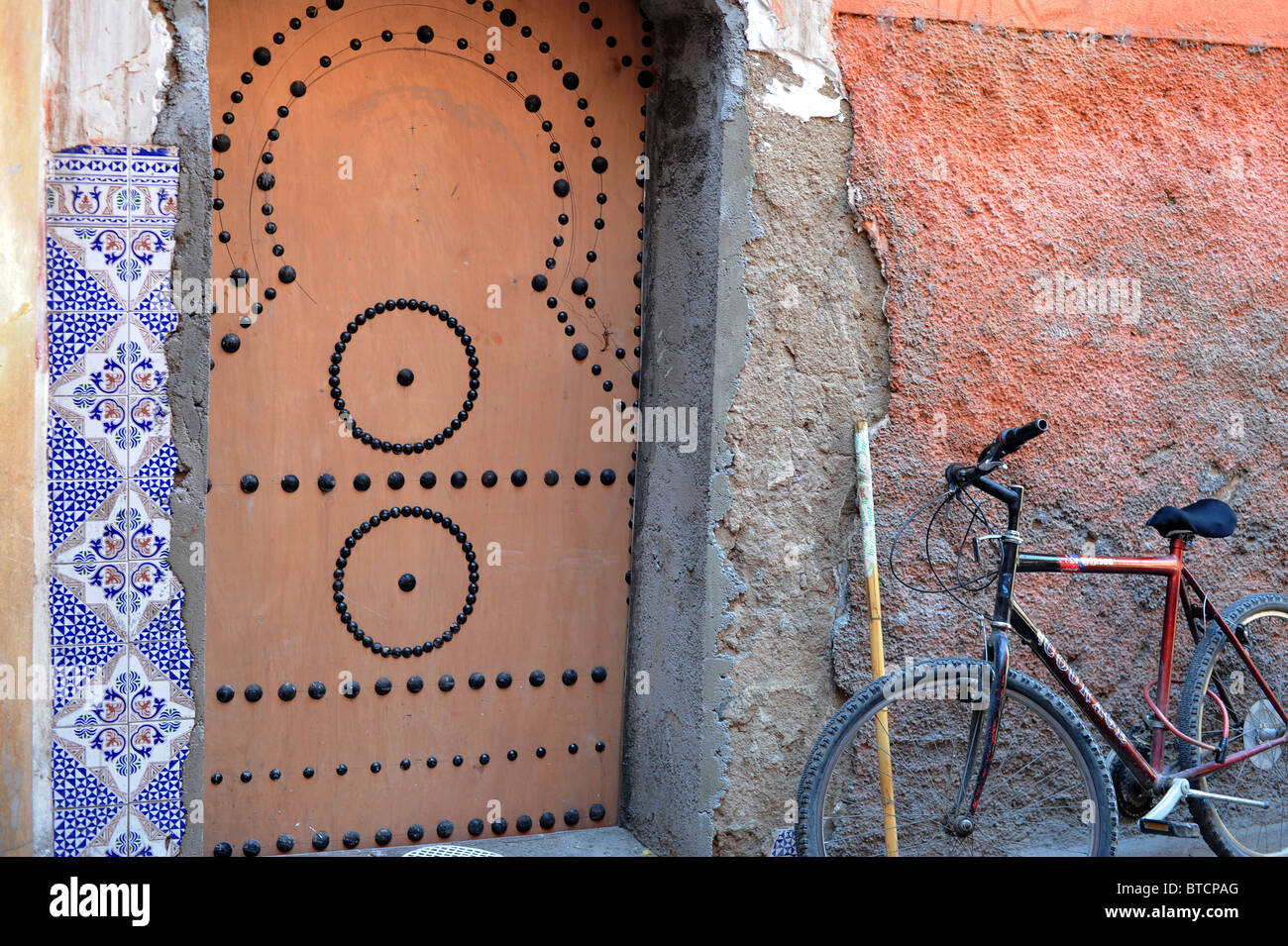 Traditional design studded door in Marrakech Souk near Djema El Fna Stock Photo