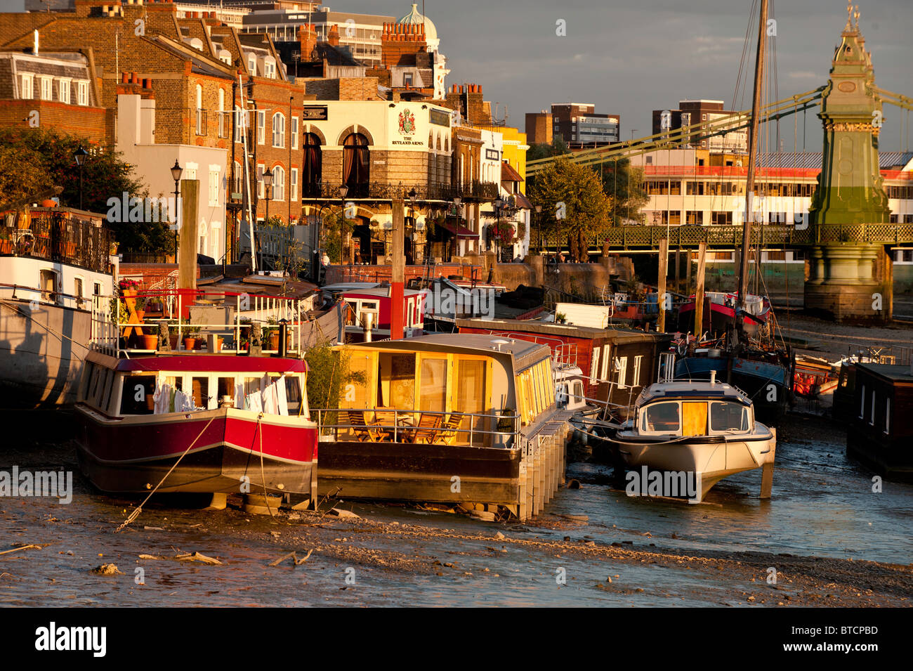 River embankment at low tide Hammersmith, W6, London, United Kingdom