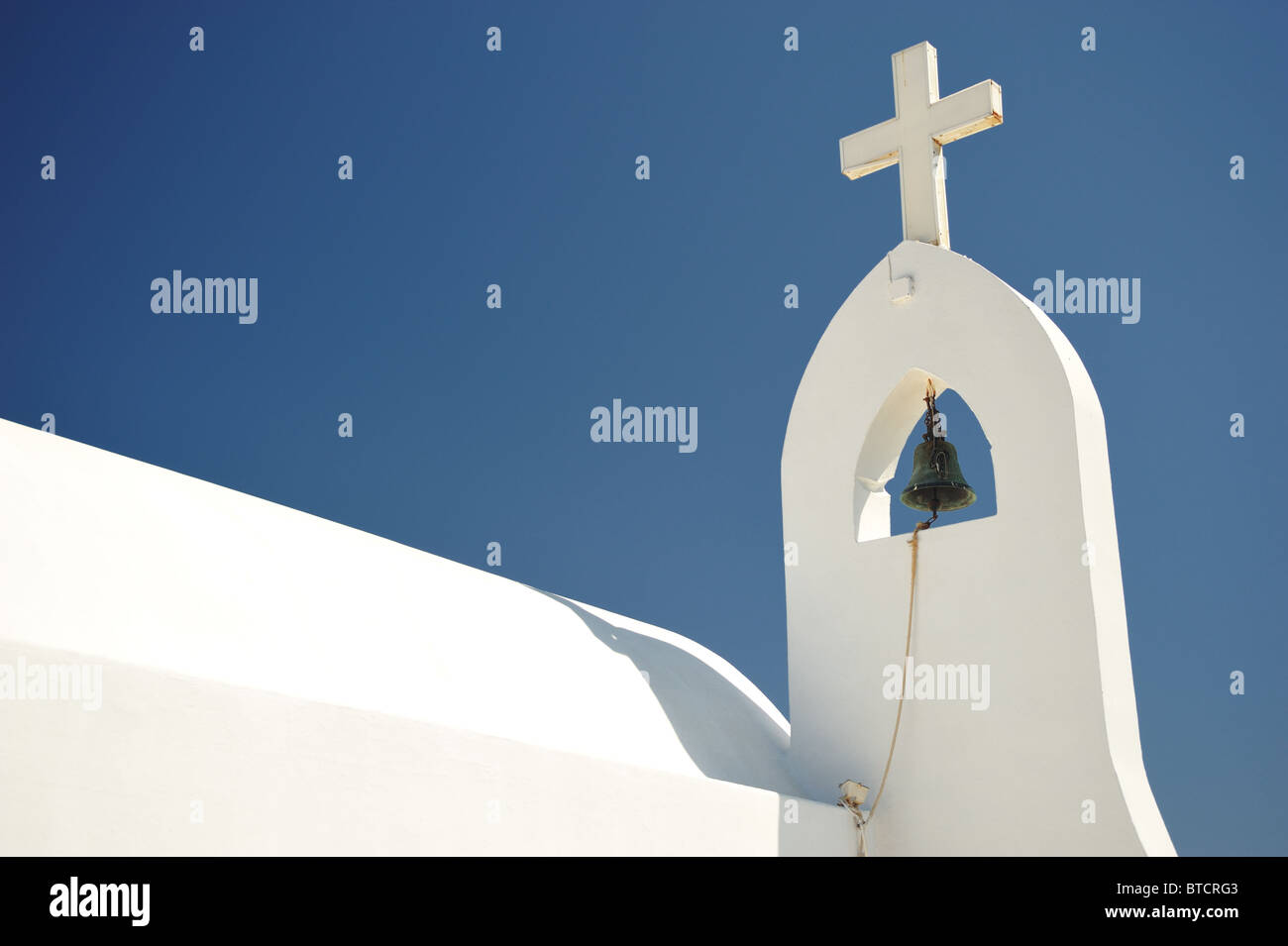 The roof of a white greek church against a clear blue sky Stock Photo ...