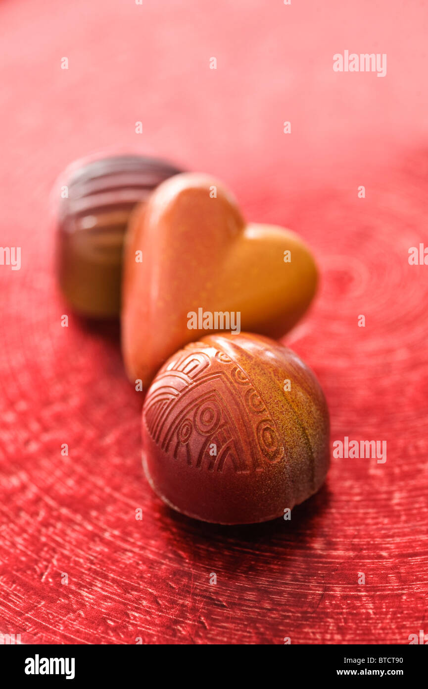 Valentine chocolate candy on dessert plate. Stock Photo