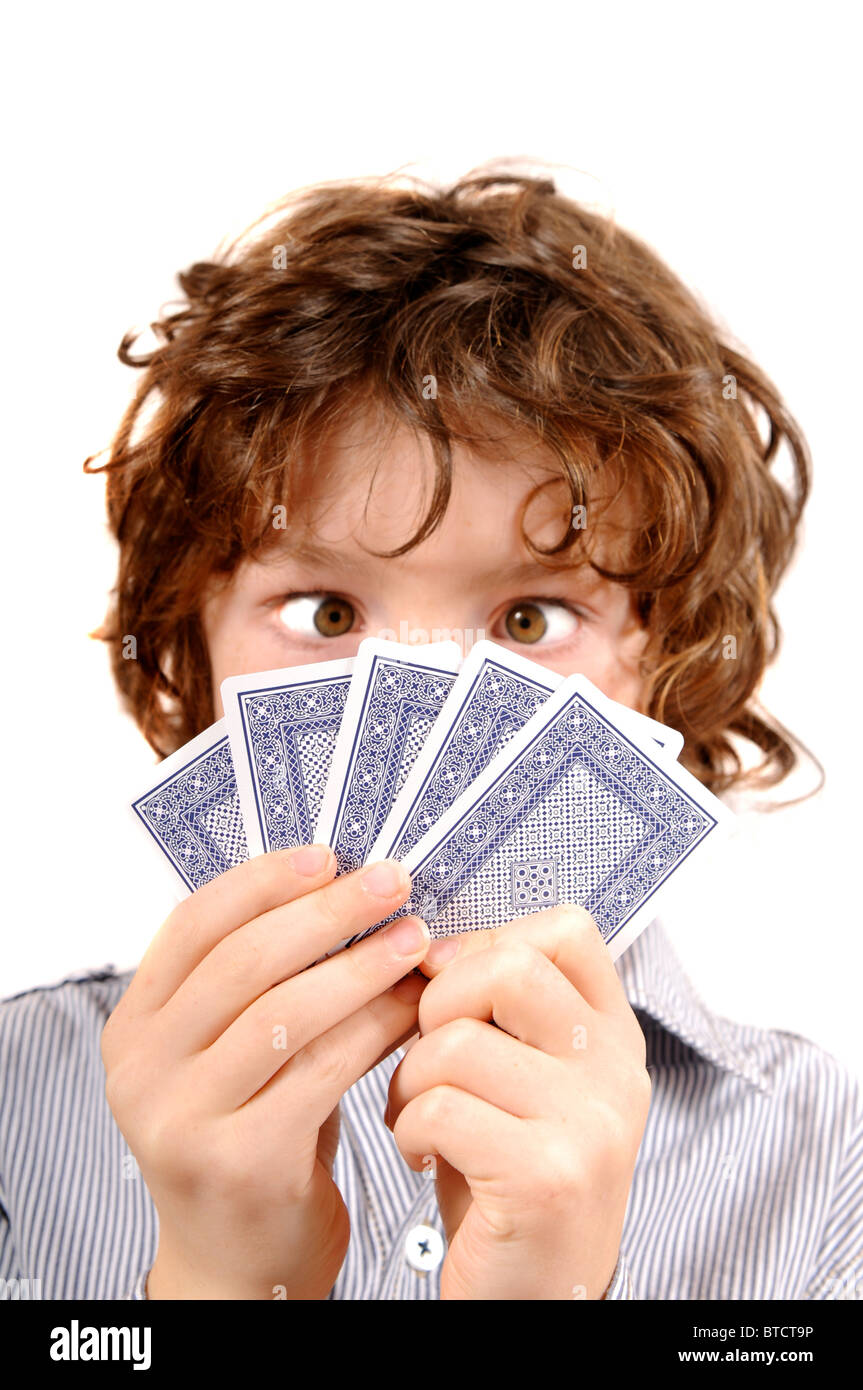 Young boy playing cards poker gambling Stock Photo Alamy