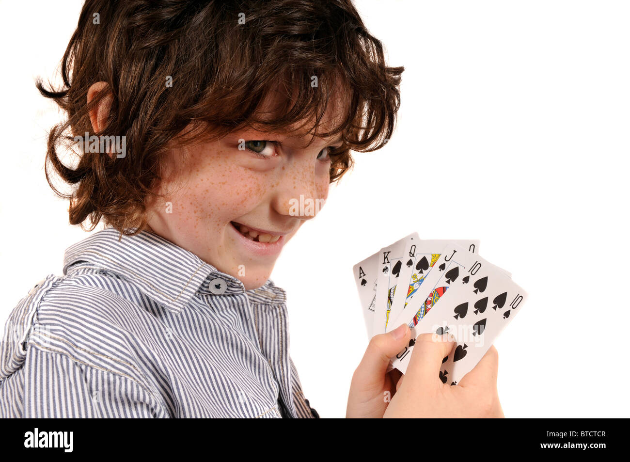 Young boy playing cards poker gambling Stock Photo Alamy