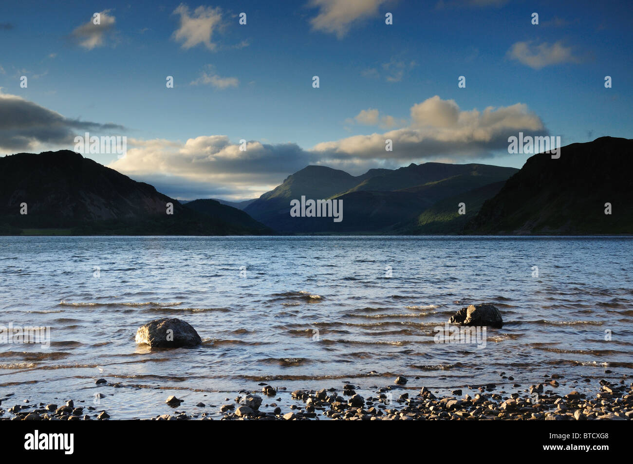 Dawn view over Ennerdale Water on a stormy morning looking towards Pillar and Steeple in the English Lake District Stock Photo