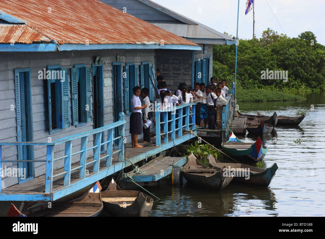 Pupils at school in a floating village in Cambodia Stock Photo - Alamy