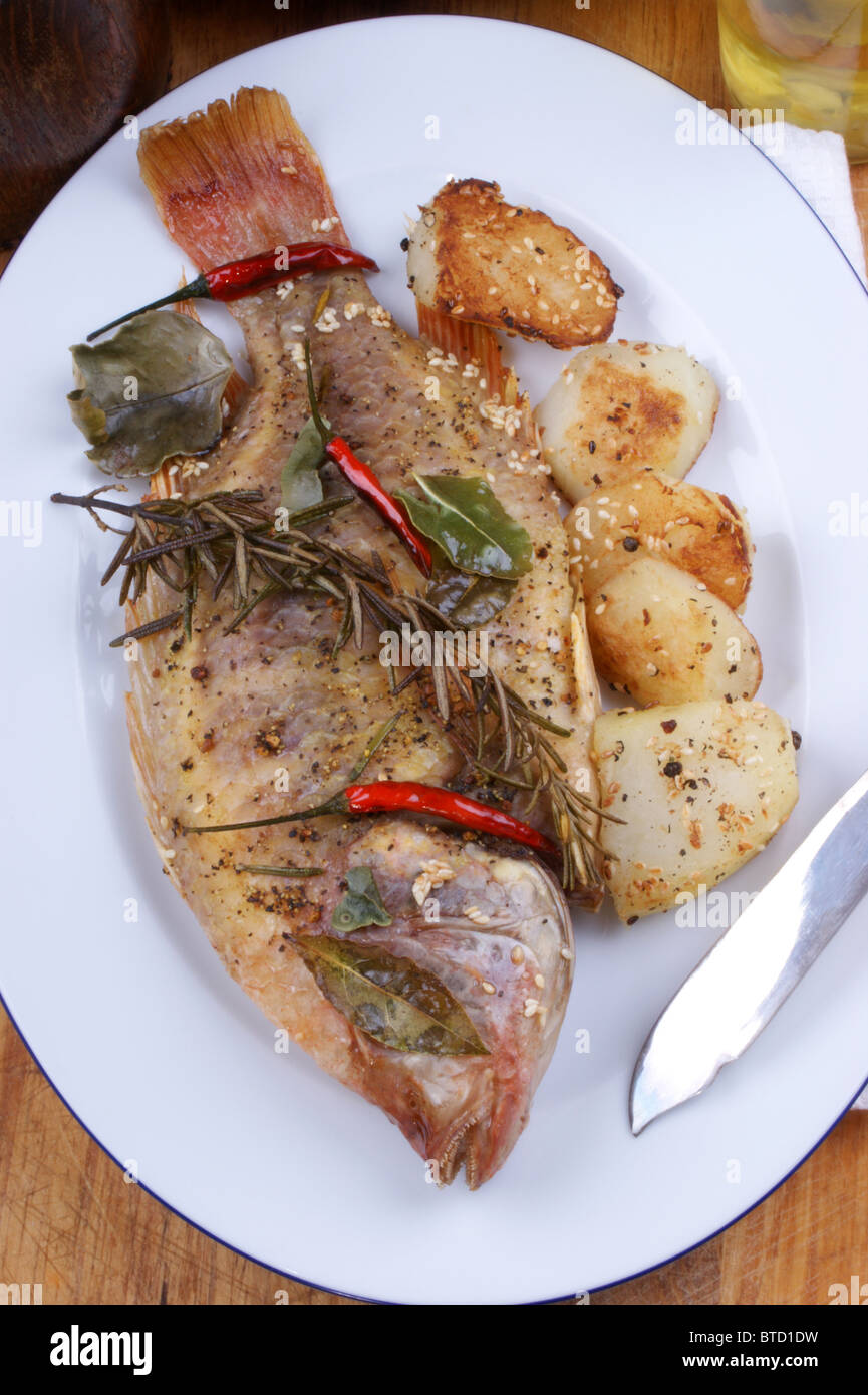grilled tilapia with spices ready to eat Stock Photo Alamy