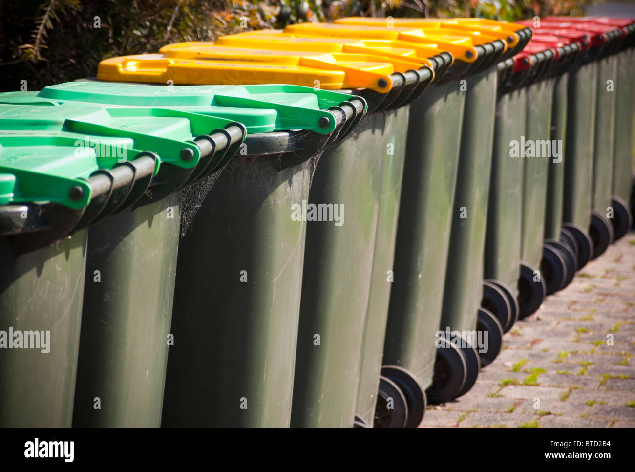 Yellow wheelie bins hi-res stock photography and images - Alamy