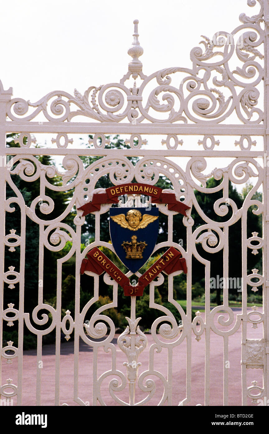 Taunton, Vivary Park Gates, town crest coat of arms heraldry English victorian white painted wrought iron Somerset England UK Stock Photo