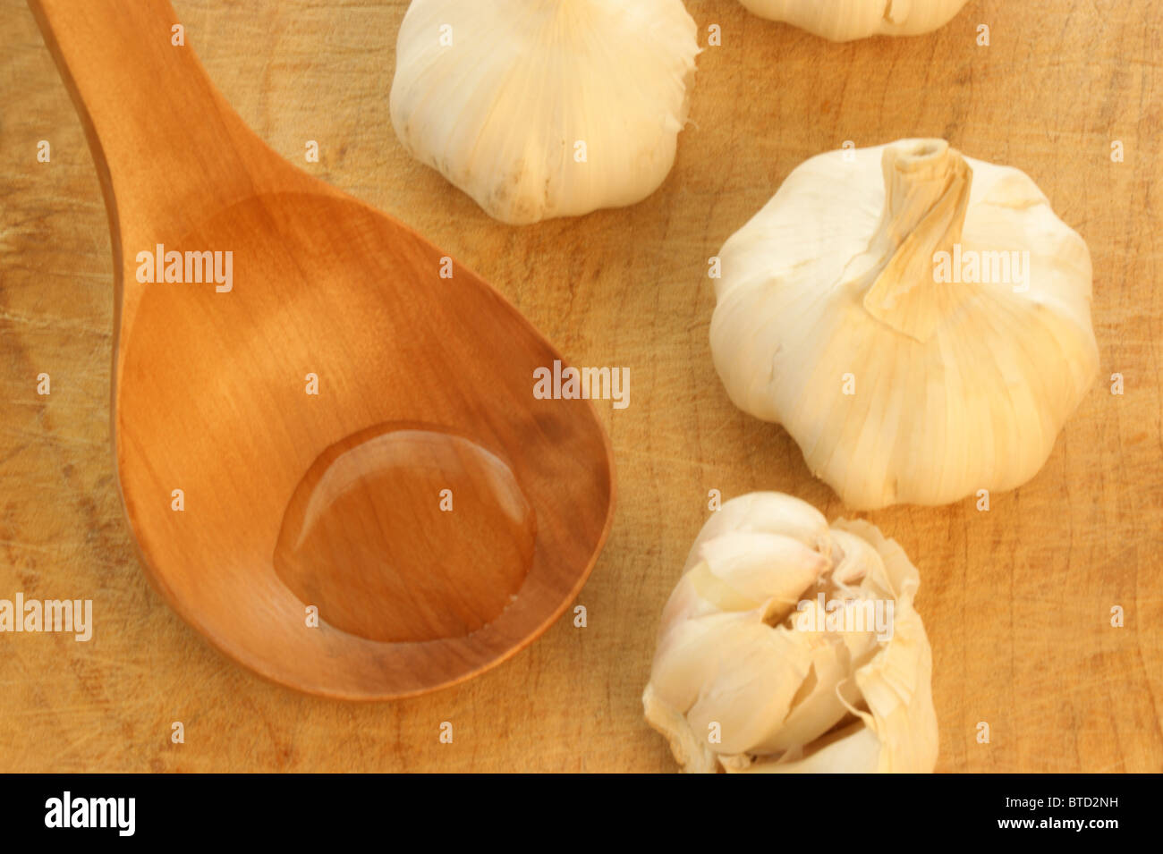 organic olive oil on a timber spoon Stock Photo - Alamy